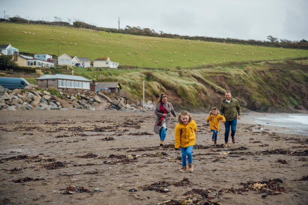 istock Family Day Out At the Beach 1282859810