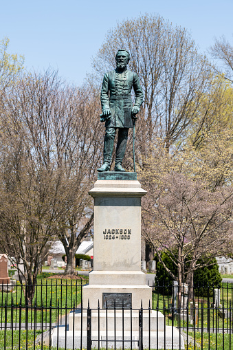 Lexington, USA - April 18, 2018: Memorial Cemetery with bronze statue of Stonewall Jackson created in 1890 by Edward Virginius Valentine