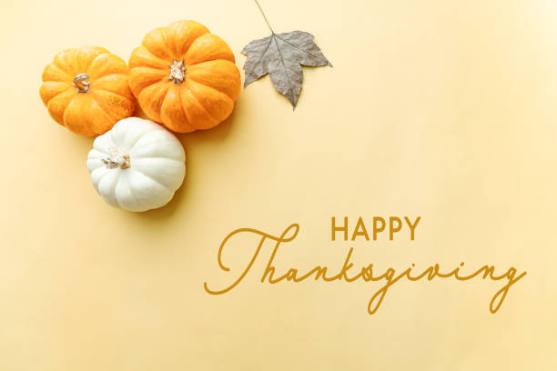 istock Happy Thanksgiving Day with pumpkin, maple leaf and nut 1282861433