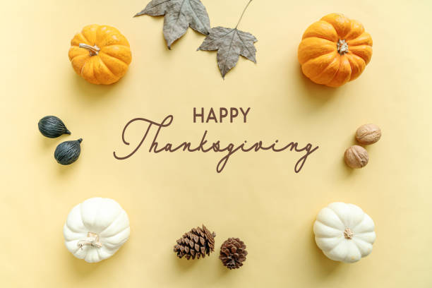 istock Happy Thanksgiving Day with pumpkin, maple leaf and nut 1282861470