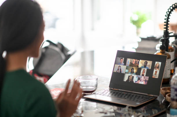 woman on a zoom call - filipino ethnicity audio imagens e fotografias de stock