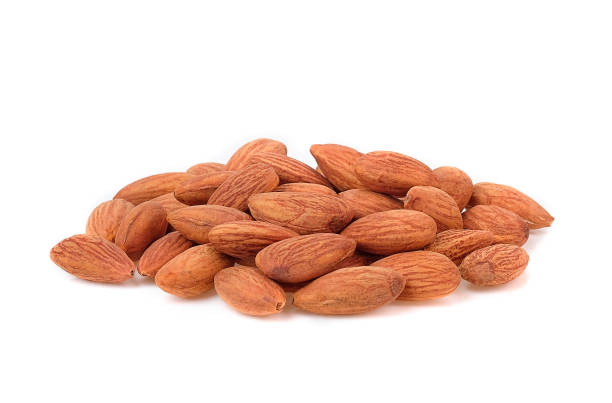 istock almond seed isolated on the white background . 1282861495