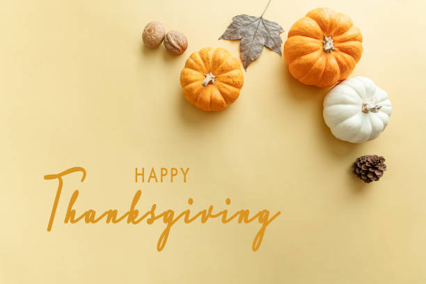istock Happy Thanksgiving Day with pumpkin, maple leaf and nut 1282861500