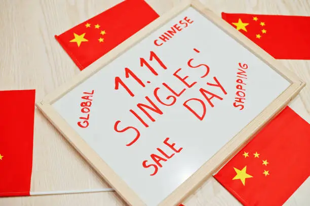 Chinese singles day theme. Board with China flags.