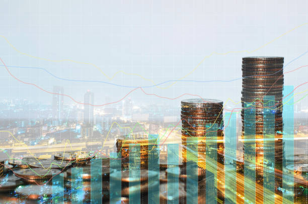 istock double exposure of city with row of coin stack with growth chart and graph progress report for business investment finance banking and money saving concept. 1282866693