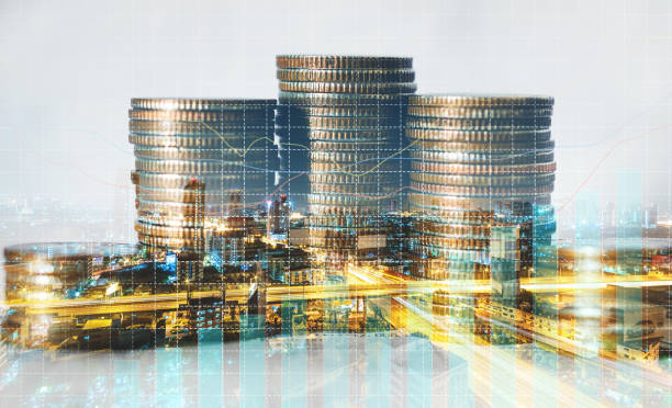 istock double exposure of city with row of coin stack with growth chart and graph progress report for business investment finance banking and money saving concept. 1282866718