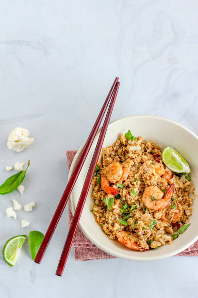 istock Cauliflower Rice with Shrimp Vertical Photo 1282866743