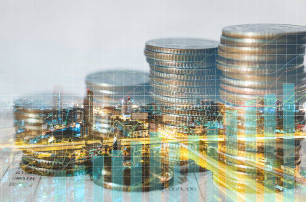 istock double exposure of city with row of coin stack with growth chart and graph progress report for business investment finance banking and money saving concept. 1282866782