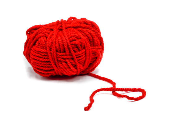 istock Red ball of wool isolated on white background 1282867635