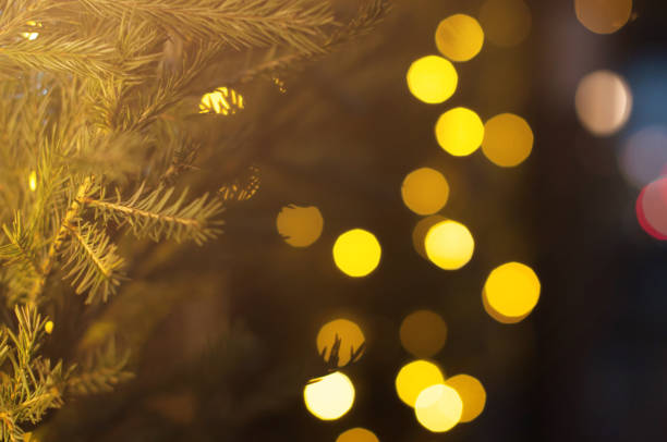 istock Holiday lights on a city streets on december night. 1282867827