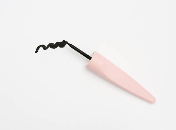 istock sample of black eyeliner and plastic brush 1282867983
