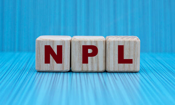 istock NPL - word on wooden cubes on a beautiful blue background 1282874836