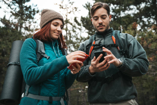istock Friends hiking together in mountain 1282875766