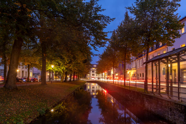 night view of the friedrichstaler canal in Detmold Detmold, Germany - October 15, 2020: night view of the friedrichstaler canal in Detmold, Germany detmold stock pictures, royalty-free photos & images
