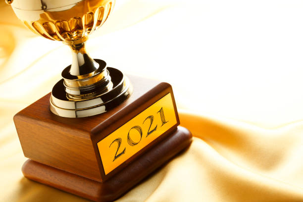 trophy engraved with 2021 - gold medal medal winning trophy imagens e fotografias de stock