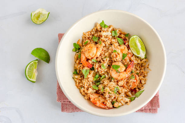 Cauliflower Shrimp Fried Rice in a Bowl Directly Above Photo