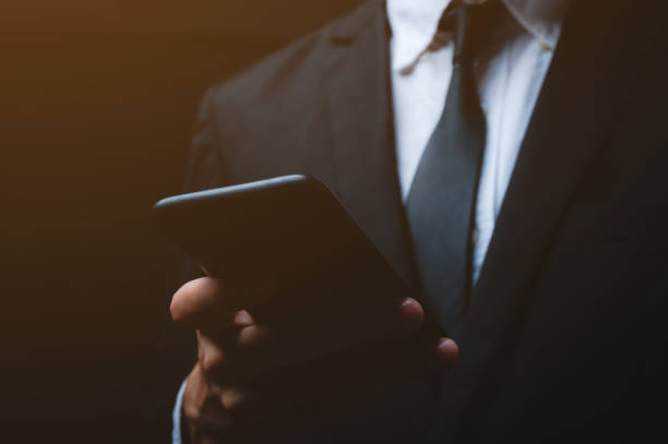 istock businessman using smartphone for business working 1282881429