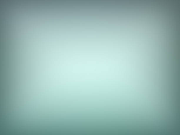 istock Abstract Background, Blue- Turquoise - White - Silver Color Gradient With A Spotlight In The Center 1282881518