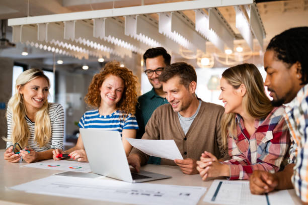 istock Happy creative designers, business people brainstorming in office 1282881868