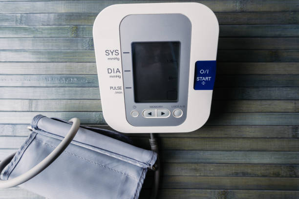 istock Blood pressure meter on wooden table 1282882003