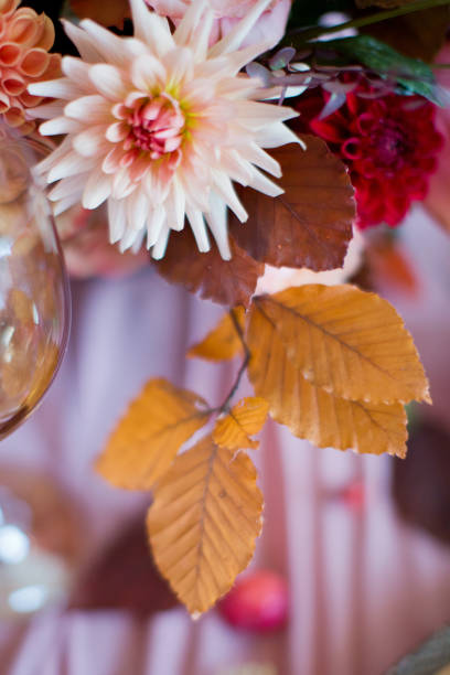 istock Autumn table setting flowers and glass 1282882185
