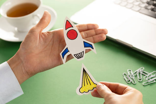 istock Business Person with Startup Rocket 1282882894