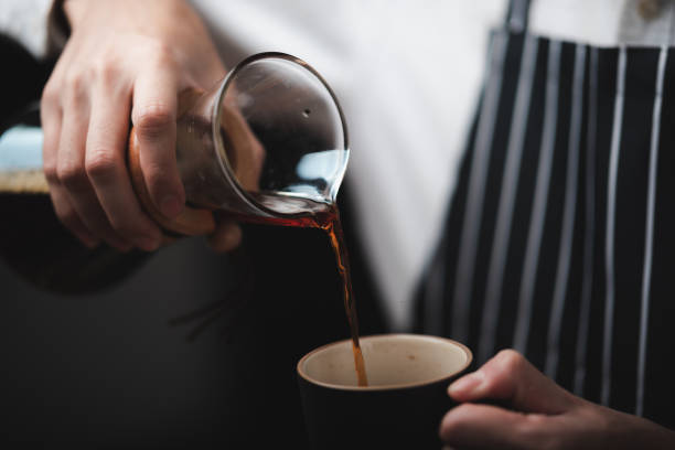 istock concept of coffee drip filter process with coffeemaker, vintage style cafe 1282883396