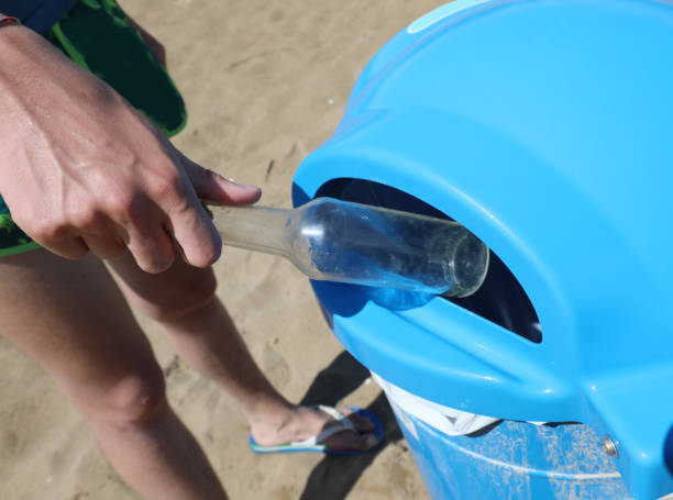 istock bottle of glass and the bin 1282884764