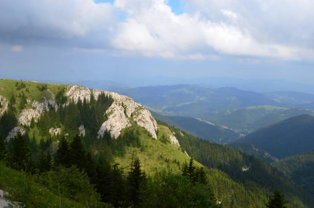 istock mountain peaks illuminated by the sun 1282885797
