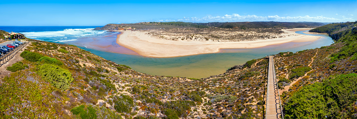 panoramic view of Praia da Amoreira with Wooden walkway to the beach  and river, vicentine coast, Aljezur, Algarve, Portugal