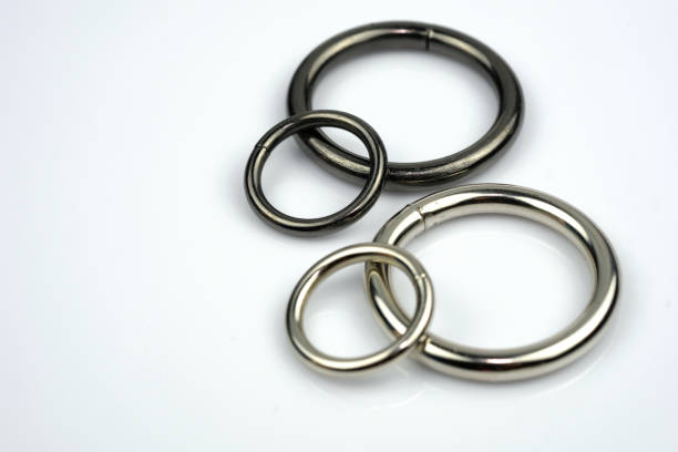 istock Metallic black and gray chrome rings for making bags and backpacks. 1282890151