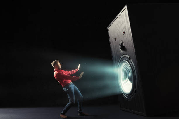 istock Powerful sound wave with funny sound speaker and screaming man. 1282890257