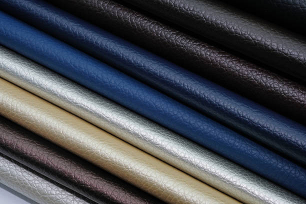 Artificial leather color palette catalog. Samples of leatherette in different shades top view. Artificial leather color palette catalog. Eco leather in blue, black, white, background. fake leather stock pictures, royalty-free photos & images