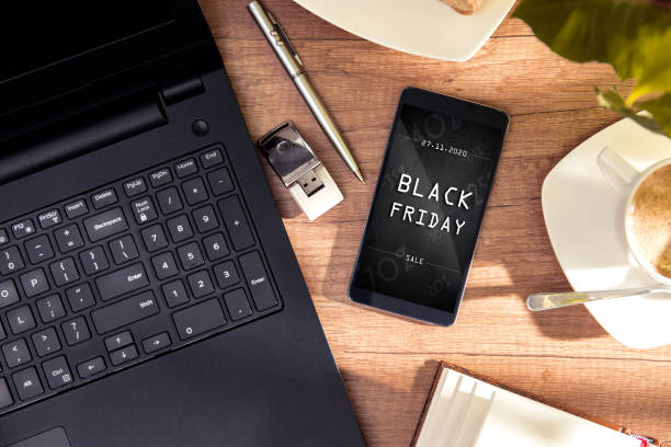 istock Smartphone with black friday banner on the screen. Conception incoming promotion in e-commerce 1282893387