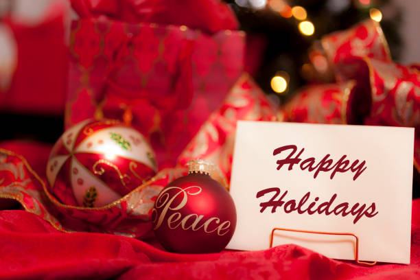 istock Christmas ornaments with a Holiday Greeting card. 1282894479