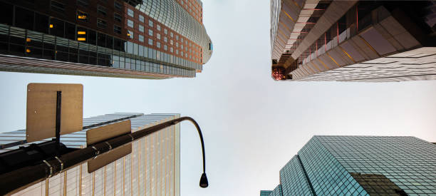 Downtown Montreal low angle panoramic view four office skyscrapers and a street light