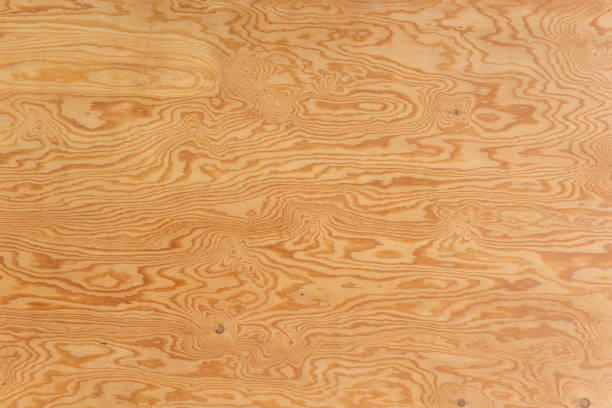 textura de madera contrachapada - knotted wood plank wall abstract texture fotografías e imágenes de stock