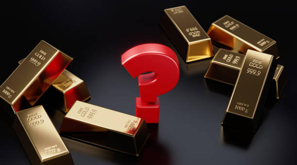 istock Red Question Mark Sitting on Black Background Amongst Gold Bars 1282903759
