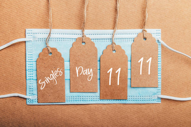 istock Singles Day or 11.11 text and face mask 1282906638