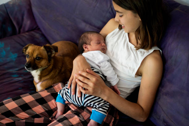 istock sister with newborn baby 1282907293