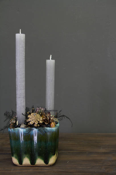 istock Minimalistic christmas composition with pine branches, cones and candles, new year concept, greeting card 1282908124