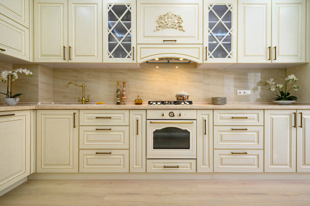 istock Beige furniture at kitchen in provence style, front view 1282910157