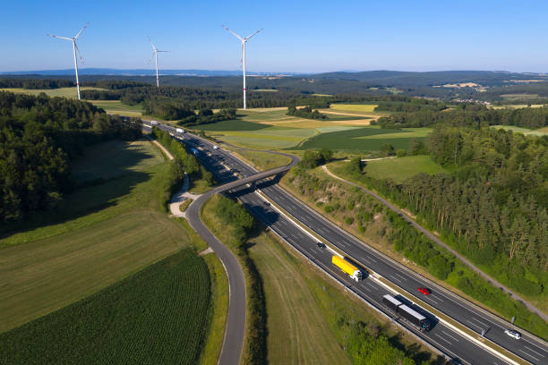 istock Trucks and Cars on Highway from Above 1282911466