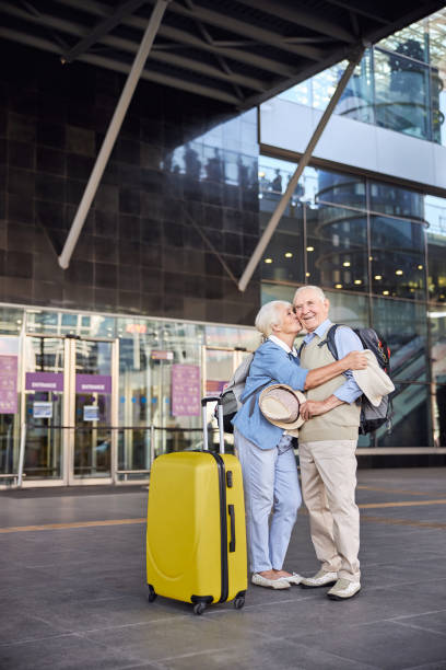 istock Affectionate lady giving a kiss to her spouse 1282912848
