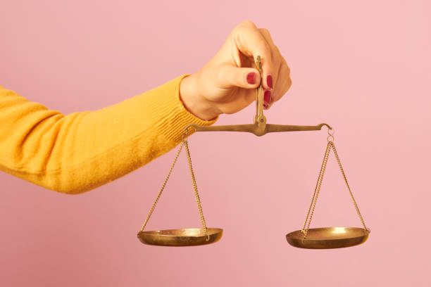 woman hand holding a balance