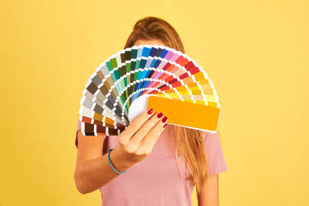 istock interior designer woman holding a color guide palette 1282915111