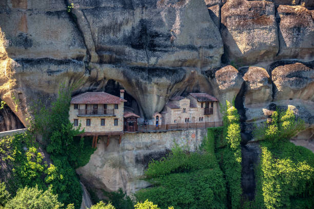 Ypapanti Monastery at Meteora, Kalampaka, Greece Ypapanti Monastery is one of the lesser known monasteries of the Meteora region. It is built into a cliff face and not easy to reach. meteora stock pictures, royalty-free photos & images