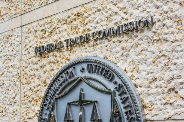 Federal Trade Commission seal, sign and logo in downtown Washington DC, USA - July 3, 2017: Federal Trade Commission seal, sign and logo in downtown federal building stock pictures, royalty-free photos & images