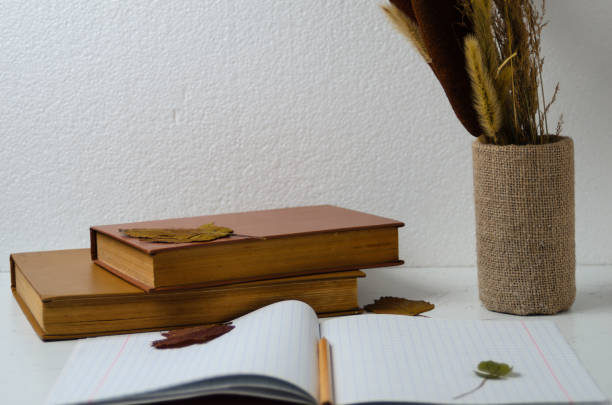 istock Notebook with a bookmark made of four-leaf clover 1282918437
