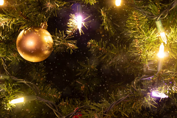 istock Christmas Baubles on Christmas Tree with lights 1282920871